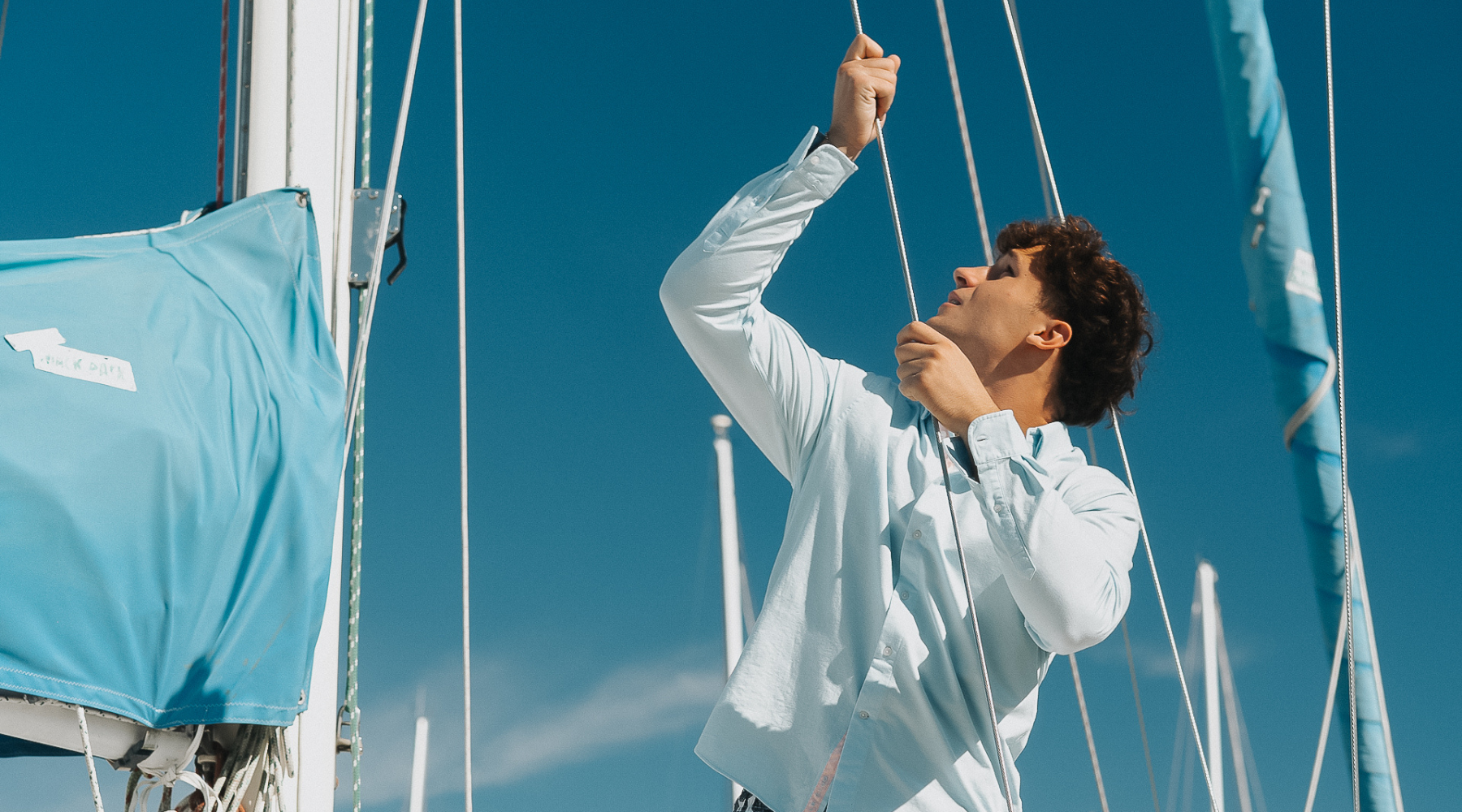 Man in Boat wearing a shirt