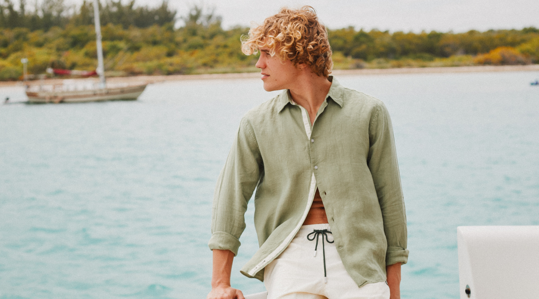 Man wearing a linen shirt at the lake