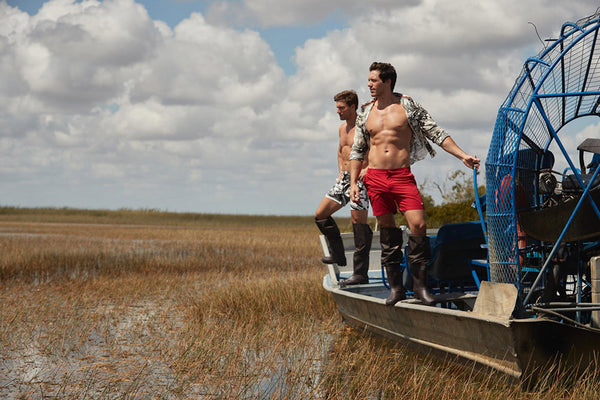 men on an airboat