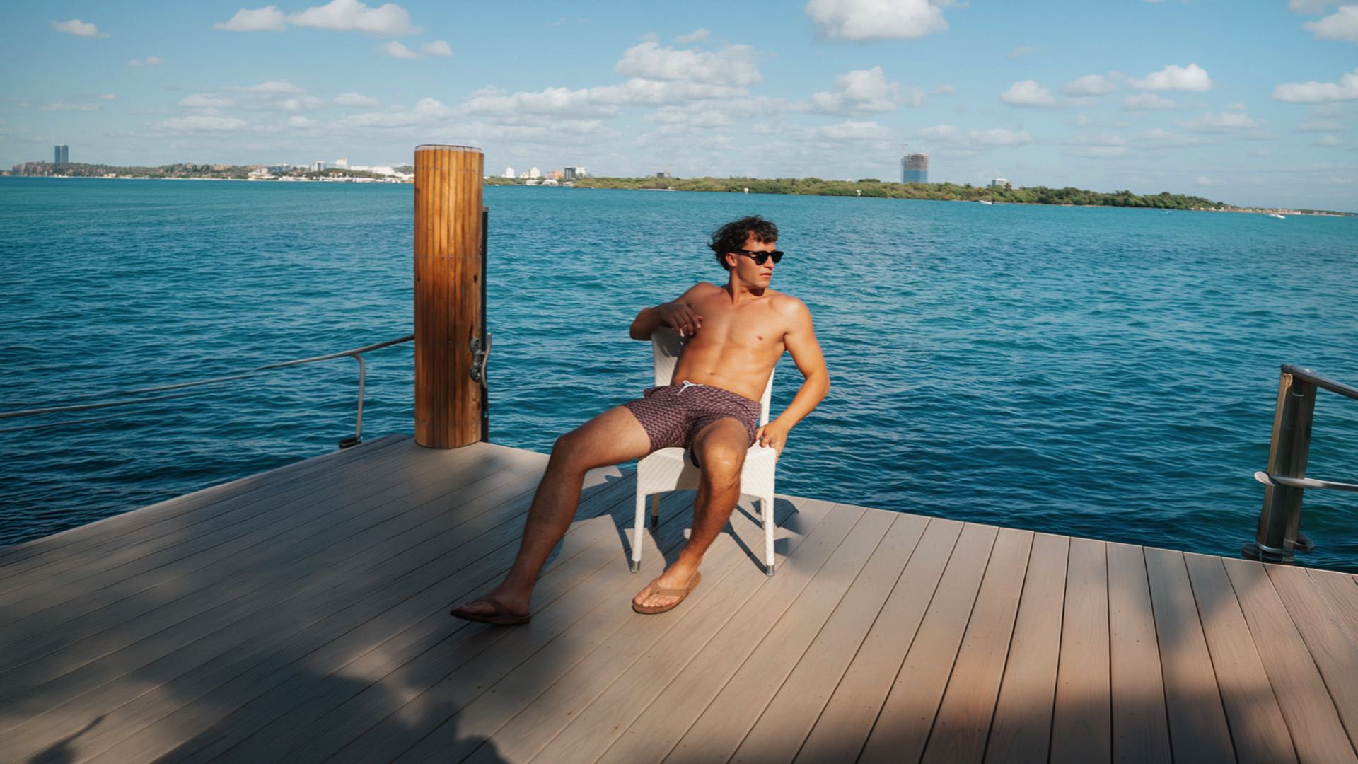 men wearing geo brown swim trunk