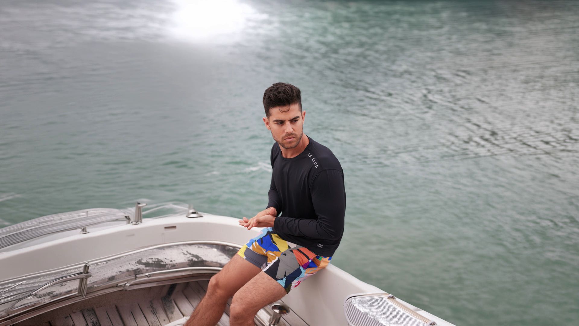men wearing a black rash guard