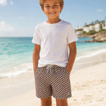 Boy wearing geo brown style at the beach 