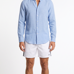 Man wearing light blue linen shirt by Le Club Original